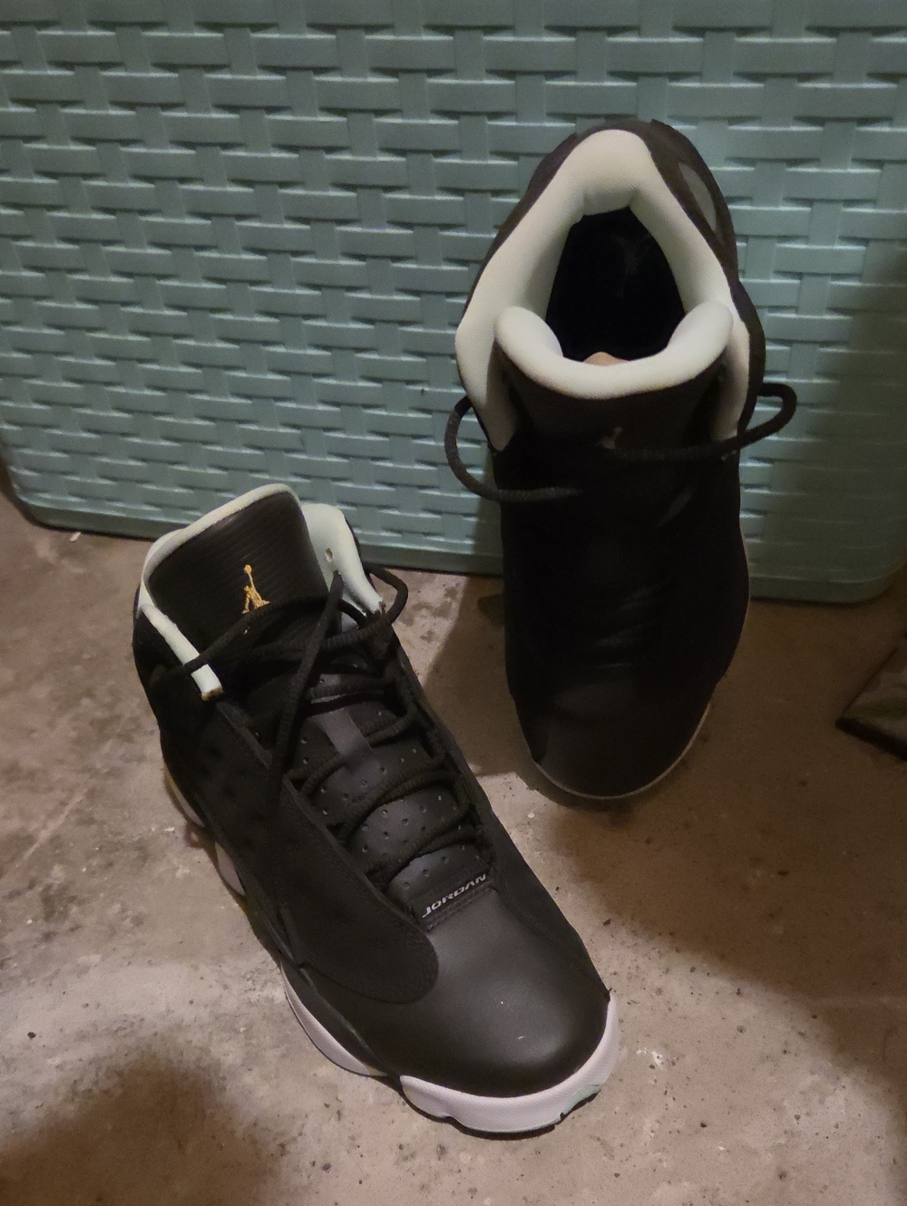 Jordan Big Kids's Black and Mint Green High-Top Sneakers with Gold Jumpman